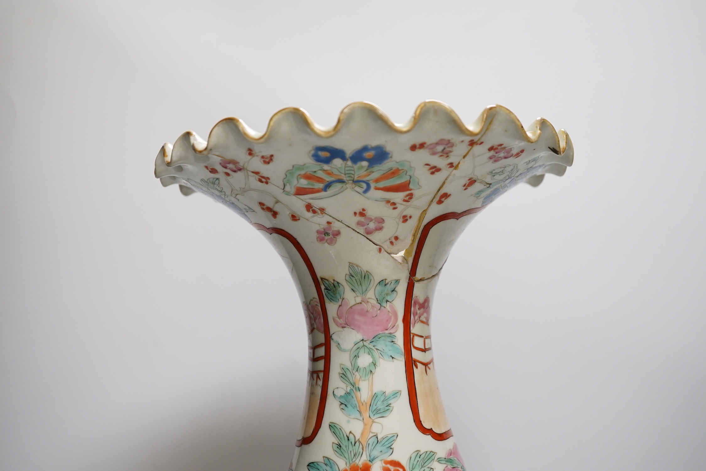 A large Japanese Imari vase together with a pair of flared top Imari vases, largest 62cm high